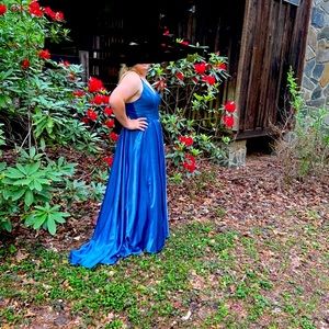 Prom dress by Alyce it is a deep French blue color